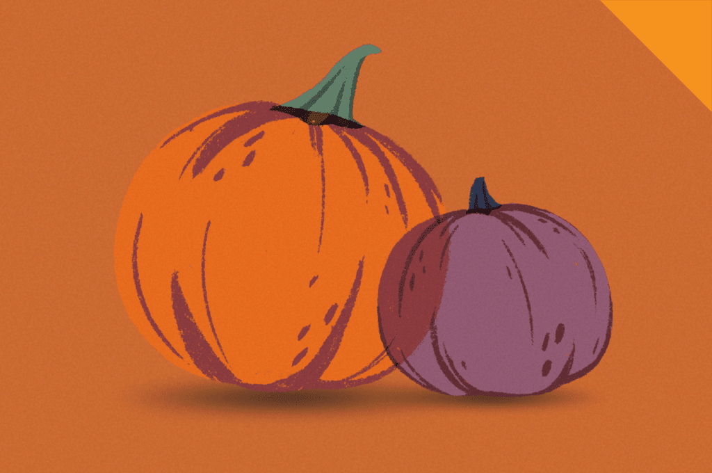 An orange and a purple pumpking leaning against each other against an orange speckled background.