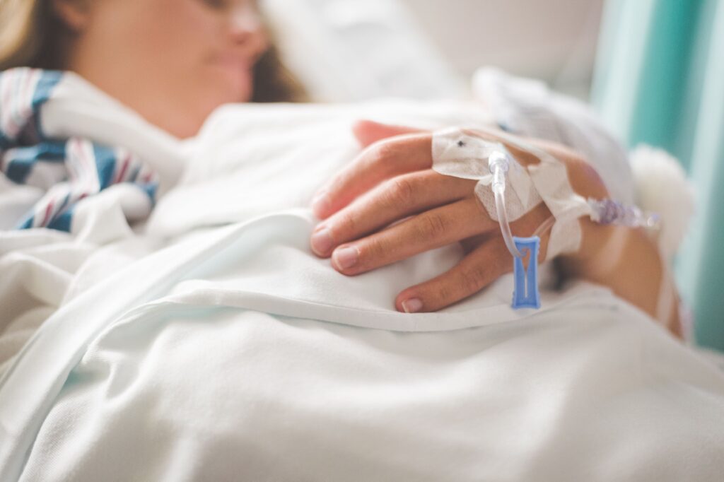 Person in a hospital having a medical crisis