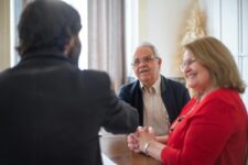 An older couple meeting with an estate lawyer